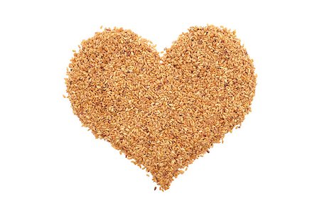 sarahdoow (artist) - Golden linseed in a heart shape, isolated on a white background Stock Photo - Budget Royalty-Free & Subscription, Code: 400-08255082