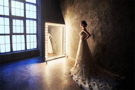 Young beautiful girl in a dress in studio Photographie de stock - Aubaine LD & Abonnement, Code: 400-08255530