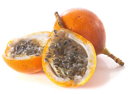 purple granadilla - passion fruit in front of white background Stock Photo - Budget Royalty-Free & Subscription, Code: 400-08255910