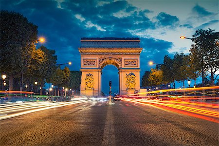 simsearch:400-05893893,k - Image of the iconic Arc de Triomphe in Paris city during twilight blue hour. Foto de stock - Super Valor sin royalties y Suscripción, Código: 400-08256073