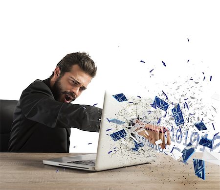 simsearch:400-08258105,k - Angry businessman breaks the pc in office Stock Photo - Budget Royalty-Free & Subscription, Code: 400-08256850