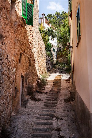 Narrow street old traditional houses village with stairs, Banyalbufar, Majorca, Spain Stock Photo - Budget Royalty-Free & Subscription, Code: 400-08257573