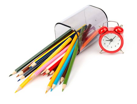 simsearch:400-04801462,k - Fallen pencil cup with crayons and red alarm clock on isolated white background, front view Stock Photo - Budget Royalty-Free & Subscription, Code: 400-08258285