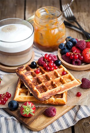 simsearch:400-07917638,k - Belgian waffles with fresh berries and cappuccino coffee for breakfast Stock Photo - Budget Royalty-Free & Subscription, Code: 400-08259369