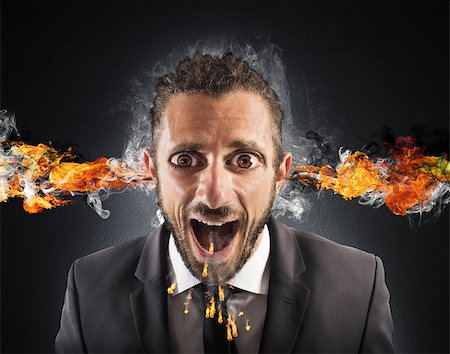 ears on fire images - Man with fire coming out of ears Stock Photo - Budget Royalty-Free & Subscription, Code: 400-08259550
