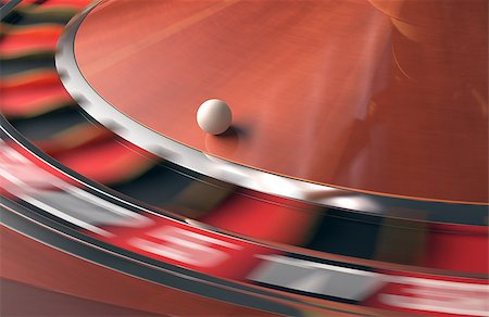 Playing roulette in the casino. Motion blur on the wheel. Stock Photo - Budget Royalty-Free & Subscription, Code: 400-08259957