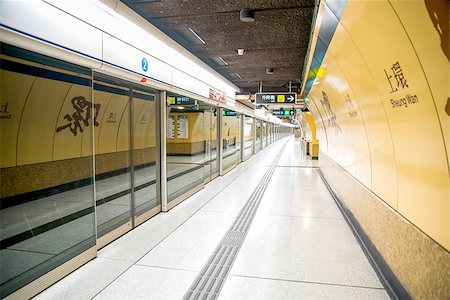 China. Hong Kong. Metro station. Early in the morning. There are no people. Fotografie stock - Microstock e Abbonamento, Codice: 400-08250189