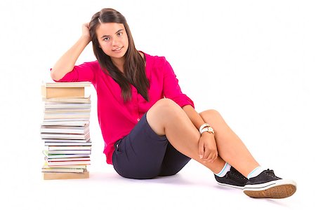 school girl holding pile of books - young student girl with stack of books on withe background Stock Photo - Budget Royalty-Free & Subscription, Code: 400-08250618