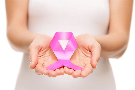 Woman holding a pink cancer awareness ribbon in her hands Stockbilder - Microstock & Abonnement, Bildnummer: 400-08250700