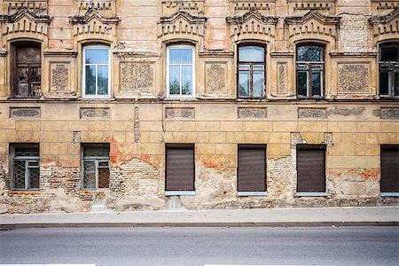 street crack - Abandoned weathered street wall with some windows Stock Photo - Budget Royalty-Free & Subscription, Code: 400-08250903