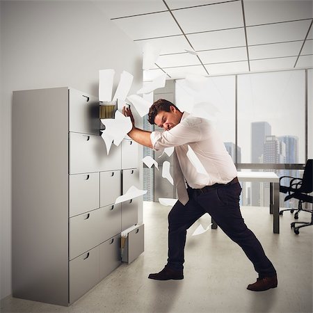 simsearch:400-09030070,k - Businessman stressed out from too much work Fotografie stock - Microstock e Abbonamento, Codice: 400-08251318