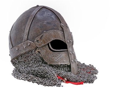 Old forged Viking helmet on a white background. Stock Photo - Budget Royalty-Free & Subscription, Code: 400-08251312