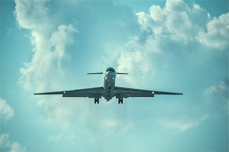 Landing of the passenger plane at the day time. Stock Photo - Budget Royalty-Free & Subscription, Code: 400-08251506