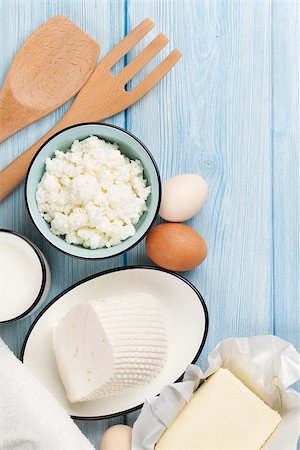 simsearch:400-08296754,k - Dairy products on wooden table. Milk, cheese, egg, curd cheese and butter. Top view with copy space Stock Photo - Budget Royalty-Free & Subscription, Code: 400-08251575