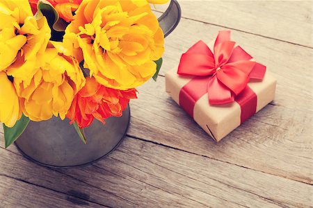 simsearch:400-08036453,k - Colorful tulips bouquet and gift box over wooden table. Retro toned Stock Photo - Budget Royalty-Free & Subscription, Code: 400-08251591
