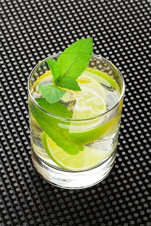 simsearch:400-07715048,k - Mojito cocktail on black rubber bar mat Stock Photo - Budget Royalty-Free & Subscription, Code: 400-08251610