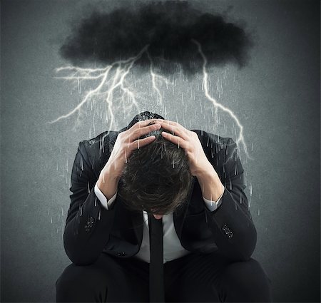 Desperate businessman with cloud over his head Stock Photo - Budget Royalty-Free & Subscription, Code: 400-08251699