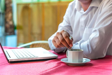 simsearch:400-08111295,k - breakfast businessman with a laptop in a cafe Stock Photo - Budget Royalty-Free & Subscription, Code: 400-08251845