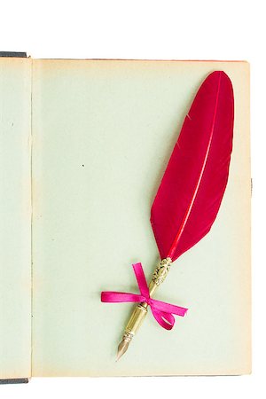 simsearch:400-06853377,k - Page of vintage  book with red feather  pen isolated on white background Stock Photo - Budget Royalty-Free & Subscription, Code: 400-08251862