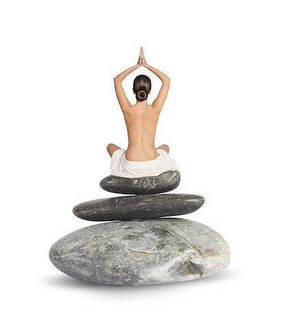 simsearch:640-03260345,k - Woman does yoga and meditates on rocks Photographie de stock - Aubaine LD & Abonnement, Code: 400-08252111