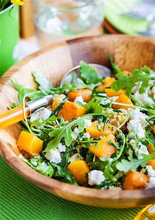 Delicious butternut squash, arugula, couscous and feta salad Foto de stock - Super Valor sin royalties y Suscripción, Código: 400-08252432