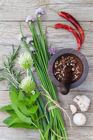 Fresh herbs and spices on garden table. Top view Stock Photo - Budget Royalty-Free & Subscription, Code: 400-08252558