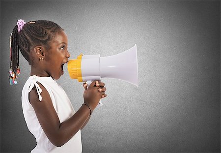 simsearch:400-06763387,k - Little girl screaming and shouting with megaphone Stock Photo - Budget Royalty-Free & Subscription, Code: 400-08253025