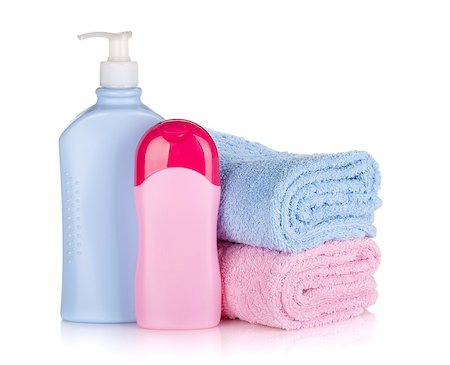 simsearch:400-04789848,k - Shampoo and gel bottles with towels. Isolated on white background Stock Photo - Budget Royalty-Free & Subscription, Code: 400-08253107