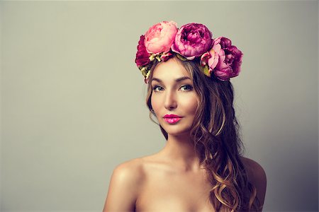 Portrait of a Young Woman with Wreath of Pink Flowers on Gray Background. Natural Beauty Concept. Toned Photo with Copy Space. Fotografie stock - Microstock e Abbonamento, Codice: 400-08253200
