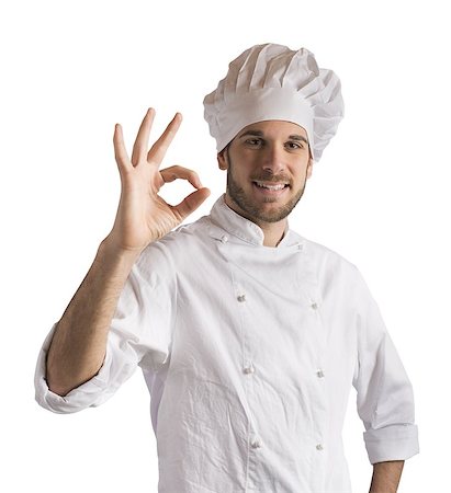 simsearch:400-08254392,k - Confident and expert chef promotes his cuisine Foto de stock - Super Valor sin royalties y Suscripción, Código: 400-08253263