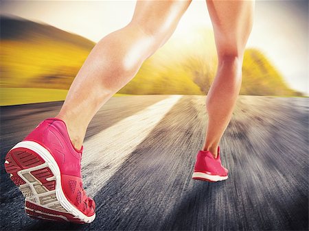 simsearch:400-07682342,k - Legs of sporty woman running on asphalt Stock Photo - Budget Royalty-Free & Subscription, Code: 400-08253473
