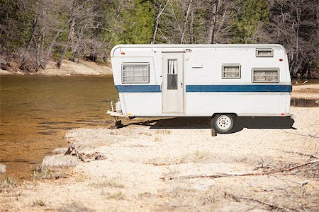 Classic Old Camper Trailer Near A Calm River. Stock Photo - Budget Royalty-Free & Subscription, Code: 400-08253990