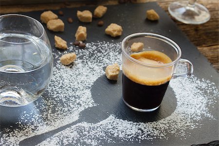 simsearch:400-04849433,k - transparent cup of coffee espresso with sugar and glass of water Photographie de stock - Aubaine LD & Abonnement, Code: 400-08264002