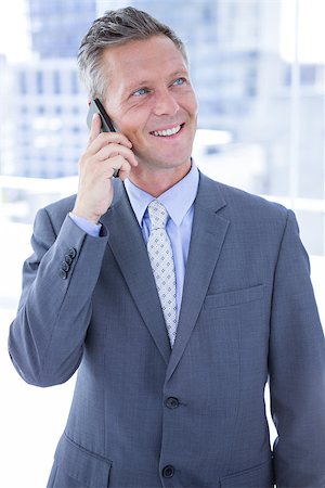 simsearch:400-07139155,k - Businessman having phone call in the office Stock Photo - Budget Royalty-Free & Subscription, Code: 400-08264484