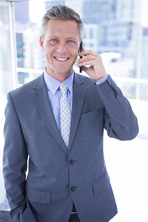 simsearch:400-07139155,k - Businessman having phone call in the office Stock Photo - Budget Royalty-Free & Subscription, Code: 400-08264486