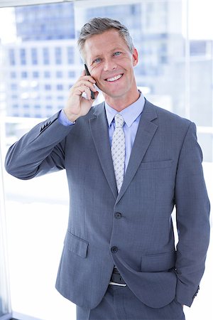 simsearch:400-07139155,k - Businessman having phone call in the office Stock Photo - Budget Royalty-Free & Subscription, Code: 400-08264482