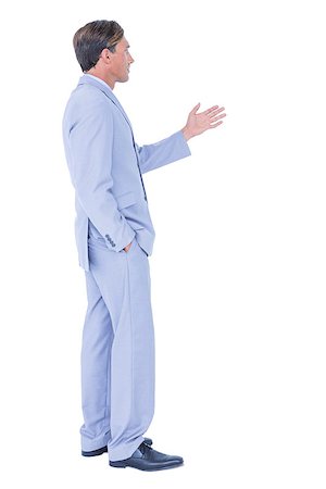 simsearch:400-06879262,k - Handsome businessman gesturing with hands on a white background Stock Photo - Budget Royalty-Free & Subscription, Code: 400-08264662