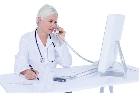 simsearch:695-05771285,k - Doctor working on her computer on a white screen Foto de stock - Royalty-Free Super Valor e Assinatura, Número: 400-08264721