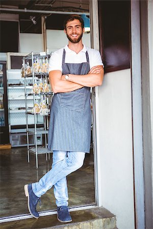 simsearch:400-08265905,k - Smiling server in apron arm crossed at the bakery Foto de stock - Super Valor sin royalties y Suscripción, Código: 400-08265873