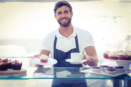 simsearch:400-08265905,k - Smiling worker prepares breakfast at the bakery Foto de stock - Super Valor sin royalties y Suscripción, Código: 400-08265925