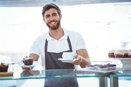 simsearch:400-08265905,k - Smiling worker prepares breakfast at the bakery Foto de stock - Super Valor sin royalties y Suscripción, Código: 400-08265921