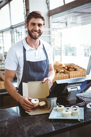 simsearch:400-08265905,k - Smiling worker prepares orders at the bakery Foto de stock - Super Valor sin royalties y Suscripción, Código: 400-08265931