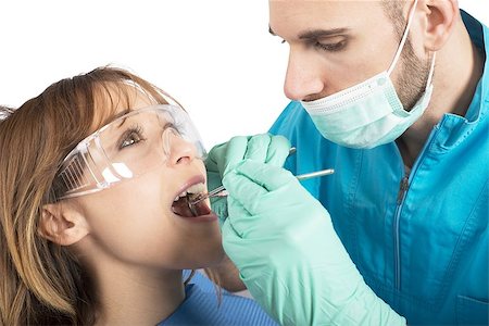 simsearch:640-02771694,k - Dentist effects a cleaning of the teeth Foto de stock - Super Valor sin royalties y Suscripción, Código: 400-08260345