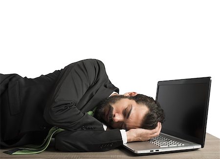 Businessman workload falls asleep tired on computer Stock Photo - Budget Royalty-Free & Subscription, Code: 400-08260349