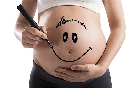 simsearch:400-08253730,k - Smiley drawn on a pregnant woman stomach Stock Photo - Budget Royalty-Free & Subscription, Code: 400-08260340