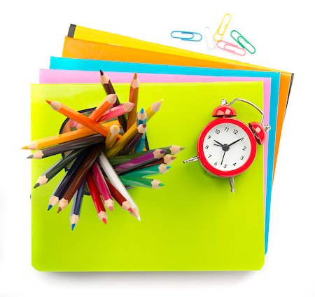simsearch:400-04801462,k - Pencil cup with crayons and alarm clock on copybooks on isolated white background Stock Photo - Budget Royalty-Free & Subscription, Code: 400-08260609