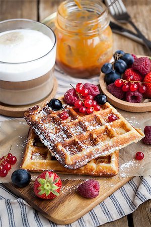 simsearch:400-07917638,k - Belgian waffles with fresh berries and cappuccino coffee for breakfast Stock Photo - Budget Royalty-Free & Subscription, Code: 400-08260662