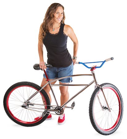 Cute adult female in shorts with bike Stock Photo - Budget Royalty-Free & Subscription, Code: 400-08261566