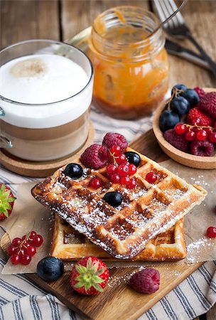 simsearch:400-07917638,k - Belgian waffles with fresh berries and cappuccino coffee for breakfast Stock Photo - Budget Royalty-Free & Subscription, Code: 400-08261940