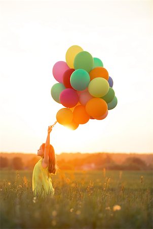 Beautiful girl with balloons outdoors Stock Photo - Budget Royalty-Free & Subscription, Code: 400-08262227